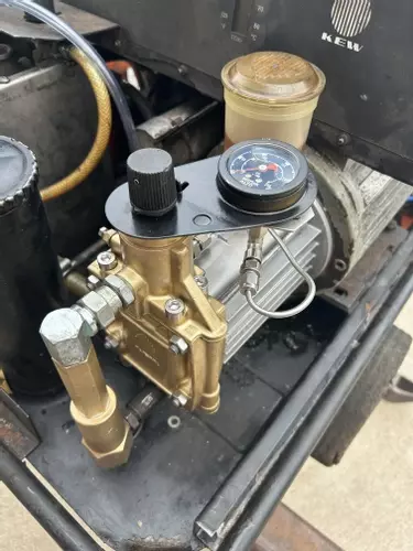 Fully reconditioned high-pressure pump fitted on a restored Kew 1502V hot pressure washer.